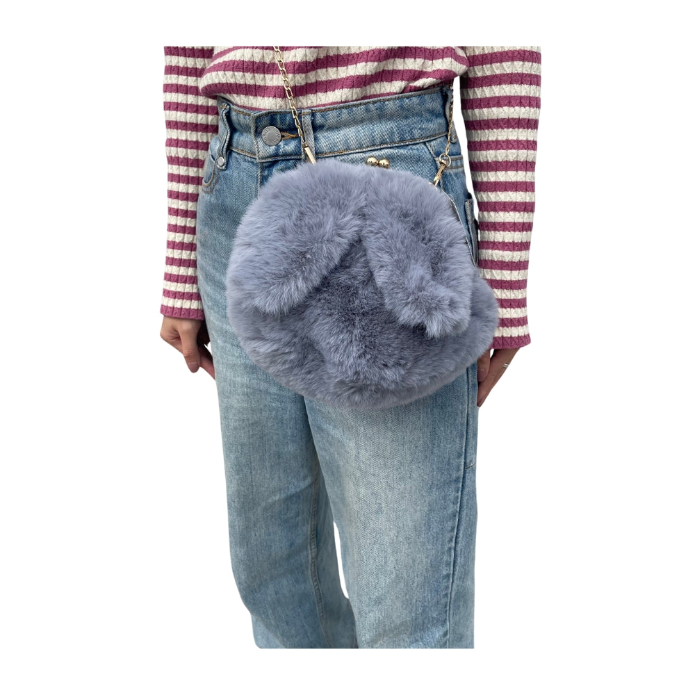 Girls wearing a Bunny Ears Purse for kids at Teddy & CoFunland