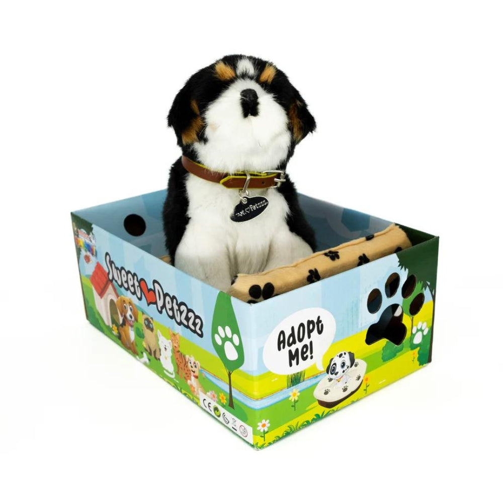 Sweet Petzzz Black Fluffy Dog toy dog inside the box.