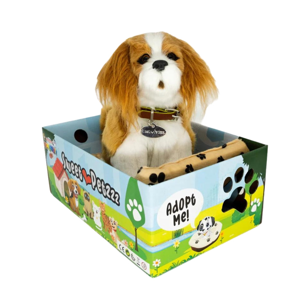 Sweet Petzzz Cavalier Brown toy dog inside the box.
