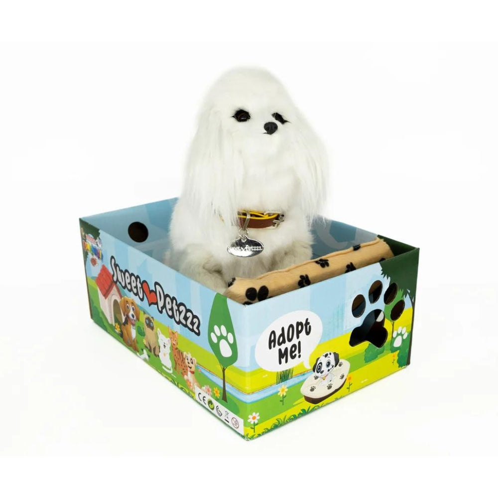 Sweet Petzzz Poodle toy dog inside the box.