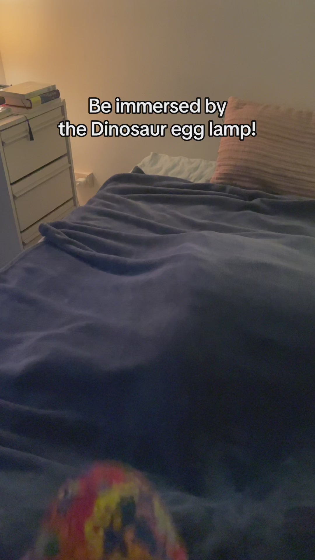 video demonstration of dinosaur egg galaxy projector in a room