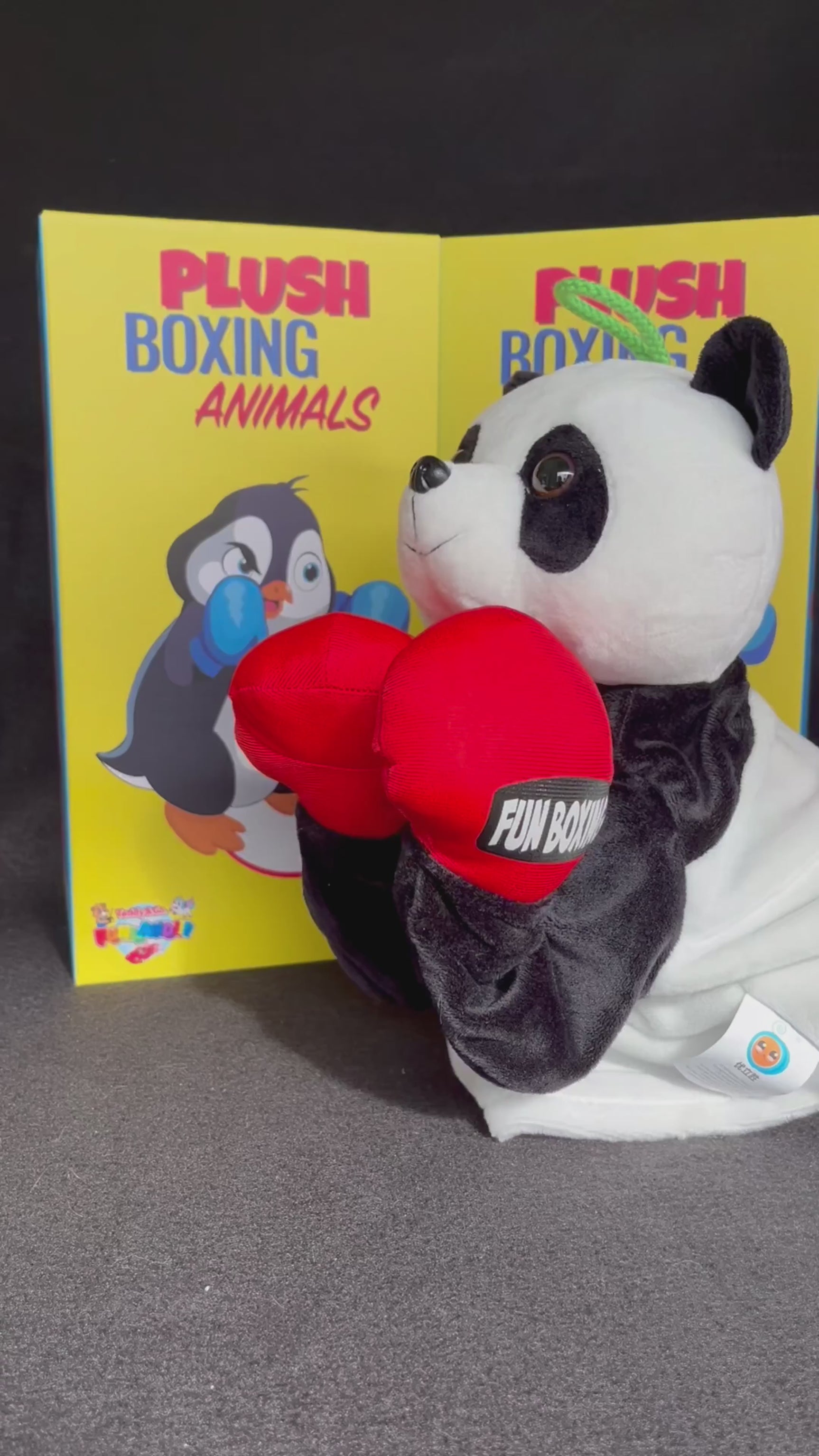 Watch the Plush Animal Boxing Toy in action as it throws punches, demonstrating the toy's boxing movements and interactive play features.
